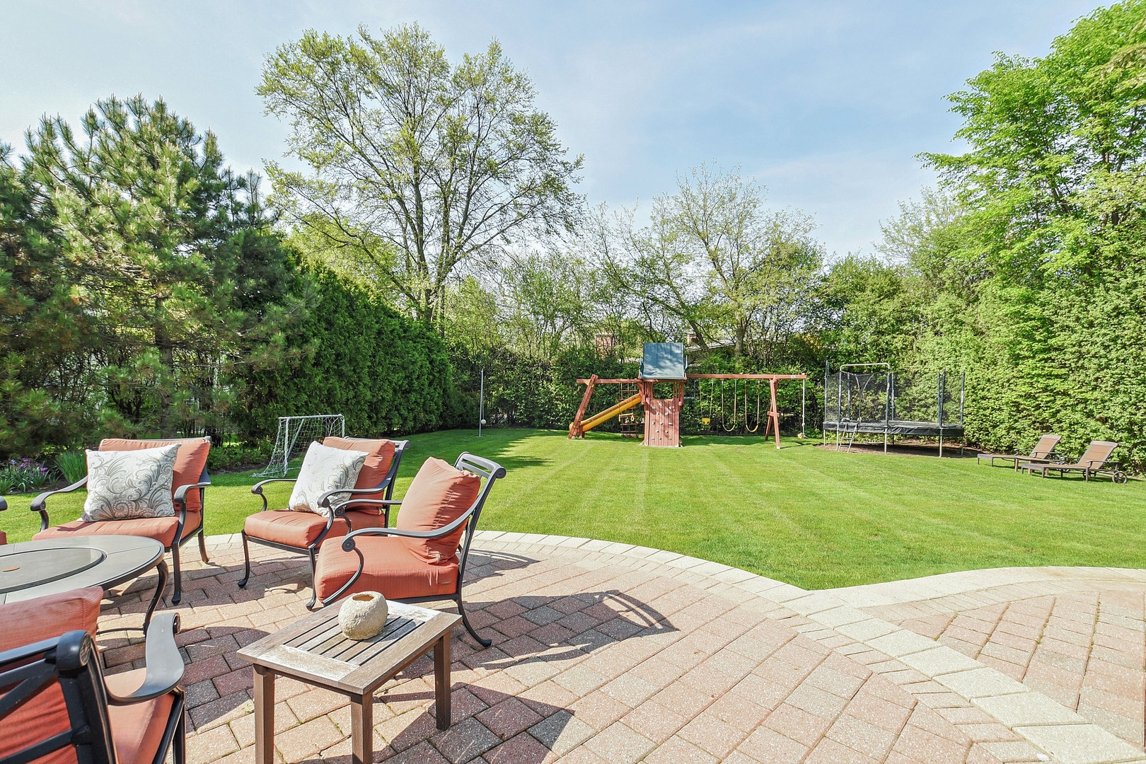 1085 Green Bay Road Glencoe, IL 60022 - Photo 21 of 24 a view of a sitting area with trees in the background