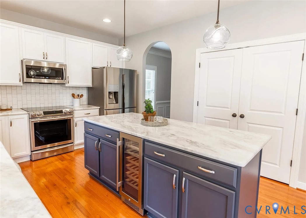 11902 Sunrise Road Henrico, VA 23233 - Photo 18 of 30 Kitchen featuring white cabinetry, stainless steel