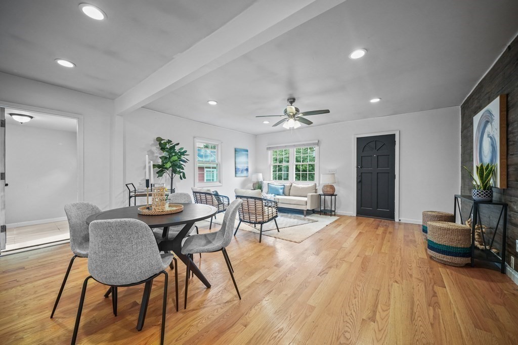 1122 Wood Street Fall River, MA 02721 - Photo 11 of 39 a view of a dining room with furniture and wooden floor