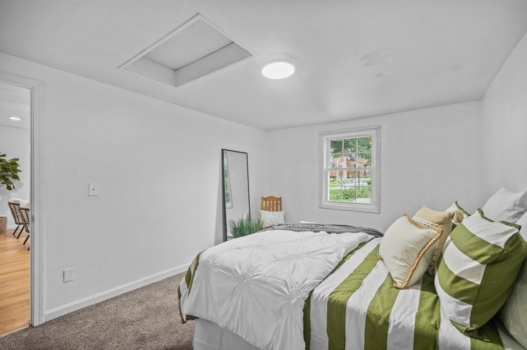 1122 Wood Street Fall River, MA 02721 - Photo 24 of 39 a bedroom with a bed and window