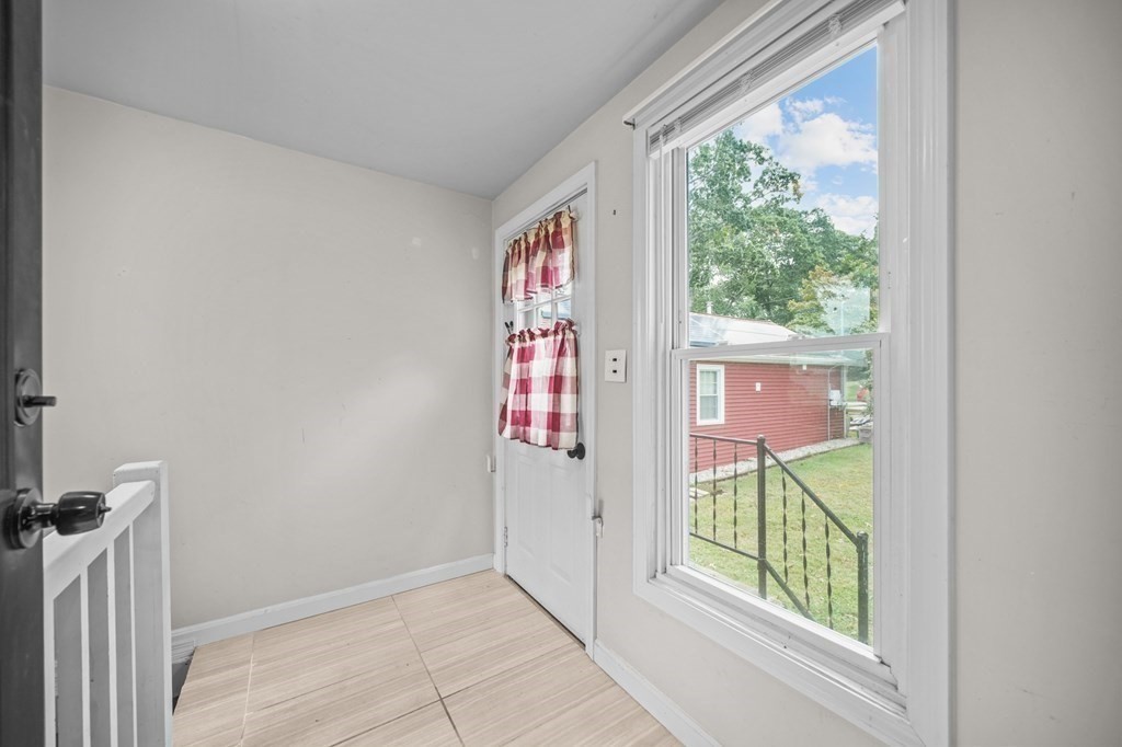 1122 Wood Street Fall River, MA 02721 - Photo 29 of 39 a very nice looking room with a large window