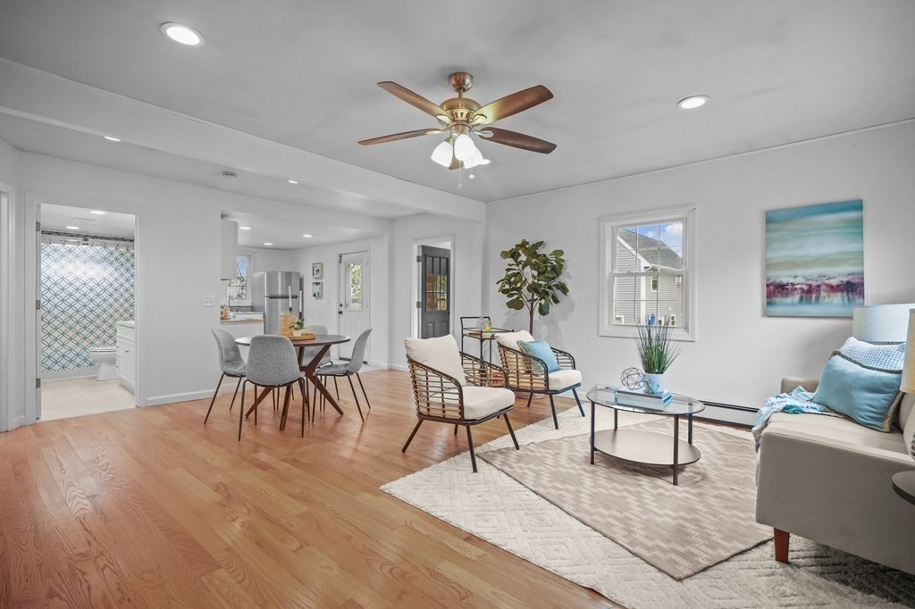 1122 Wood Street Fall River, MA 02721 - Photo 3 of 39 a work room with furniture and wooden floor