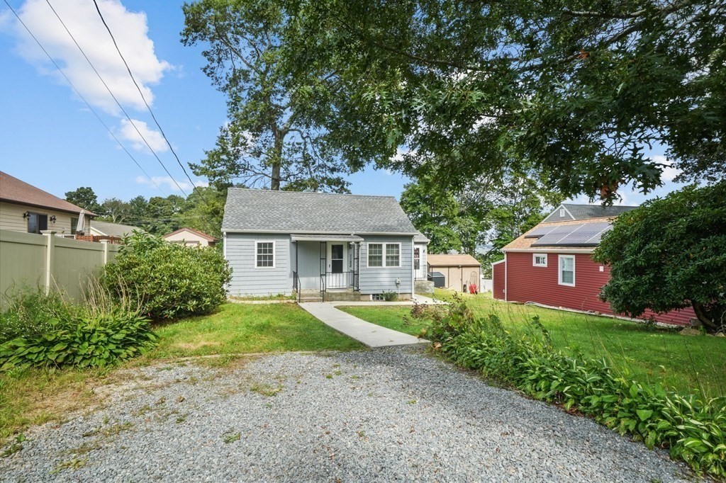 1122 Wood Street Fall River, MA 02721 - Photo 32 of 39 front view of a house with a yard