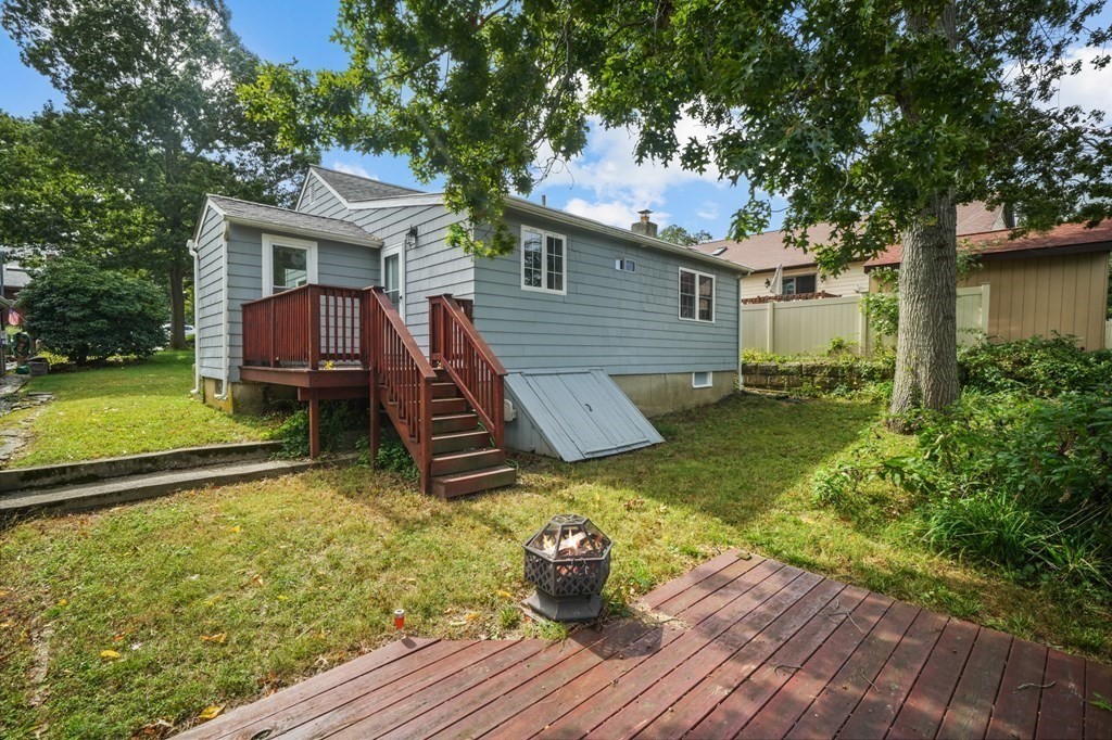 1122 Wood Street Fall River, MA 02721 - Photo 34 of 39 a view of a house with a yard and furniture