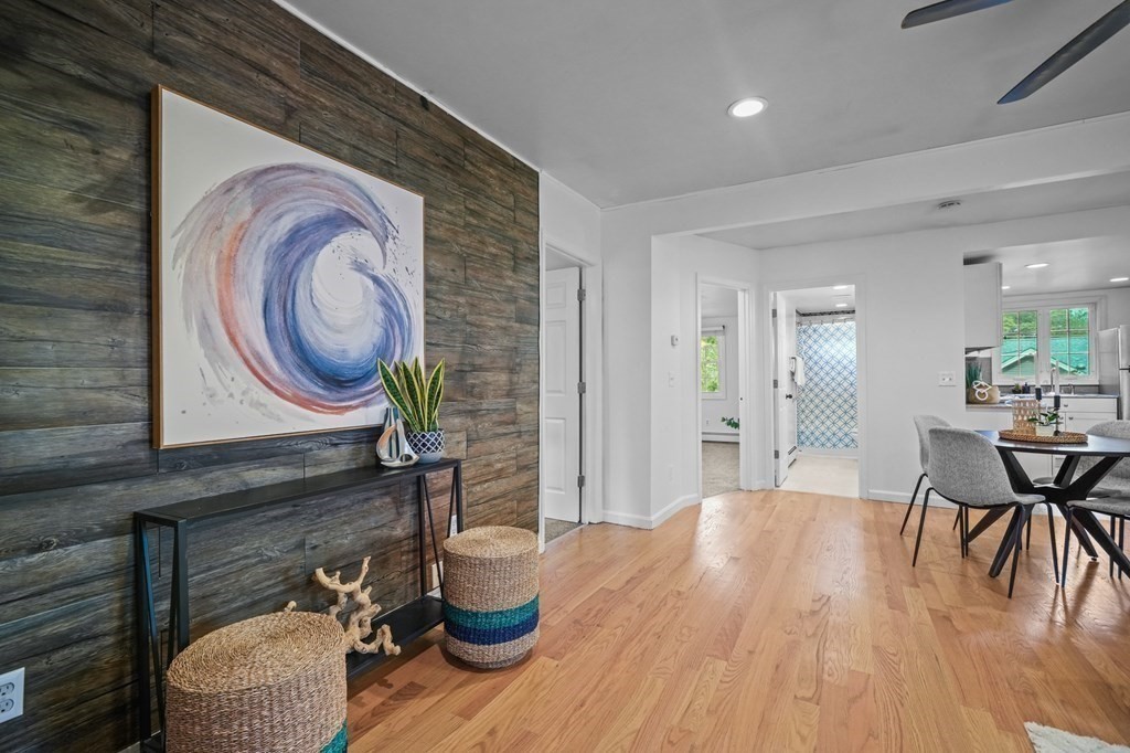 1122 Wood Street Fall River, MA 02721 - Photo 4 of 39 a living room with furniture and a wooden floor