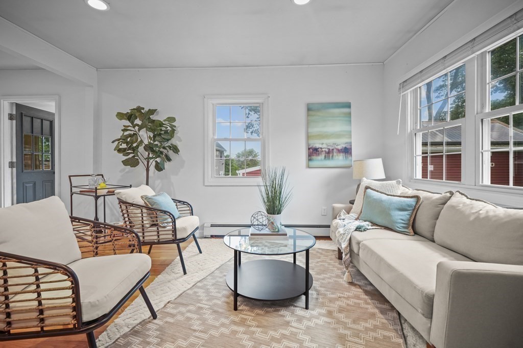 1122 Wood Street Fall River, MA 02721 - Photo 6 of 39 a living room with furniture and a potted plant