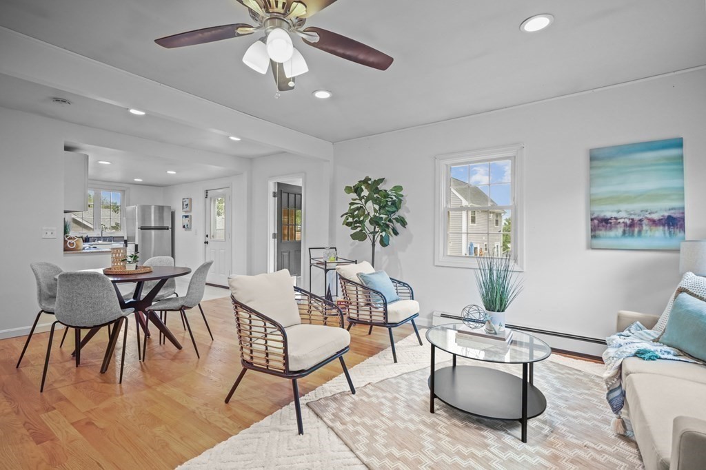 1122 Wood Street Fall River, MA 02721 - Photo 9 of 39 a view of a dining room with furniture and wooden floor