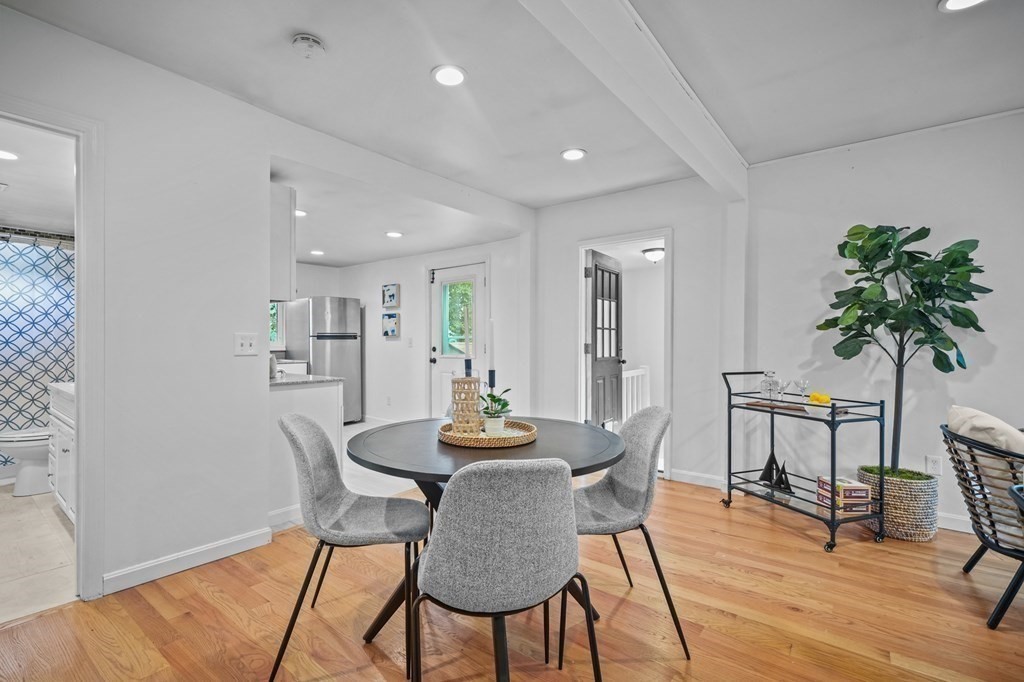 1122 Wood Street Fall River, MA 02721 - Photo 10 of 39 a view of a dining room with furniture and wooden floor