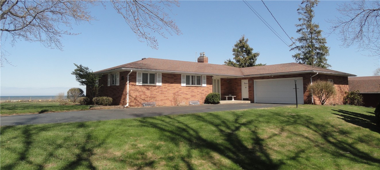 Custom spacious ranch all brick with a hip roof de
