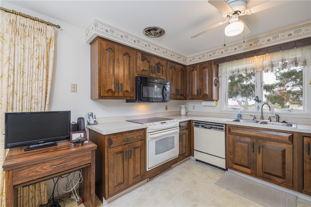 12 Lighthouse Road Parma, NY 14468 - Photo 12 of 49 Built-in range, extra wide casement window allows