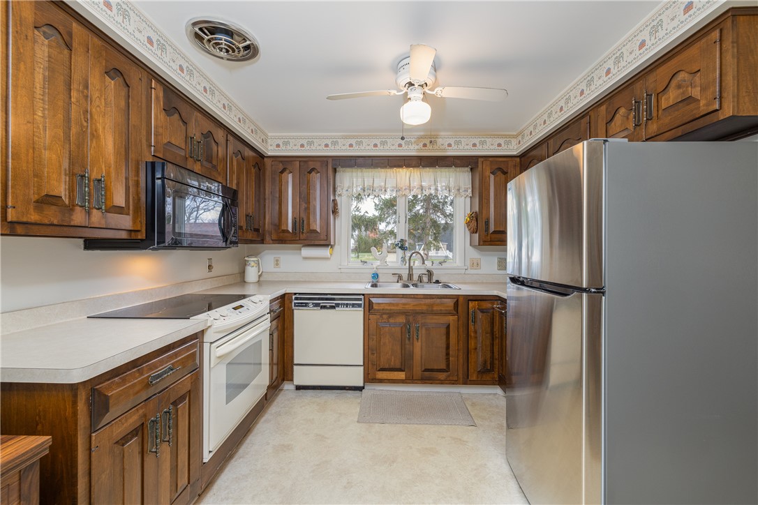 12 Lighthouse Road Parma, NY 14468 - Photo 13 of 49 Through the roof exhaust above the range.