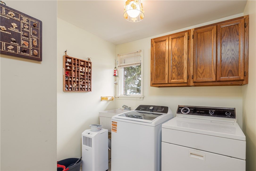 12 Lighthouse Road Parma, NY 14468 - Photo 22 of 49 Large first floor laundry with utility tub and win