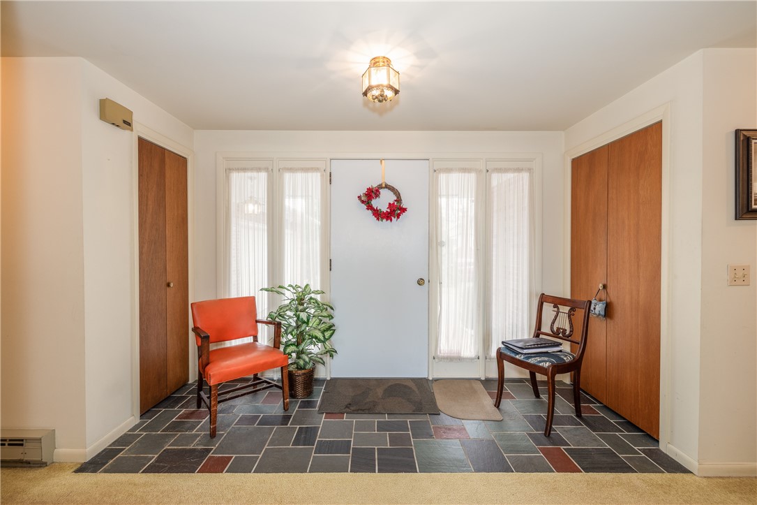 12 Lighthouse Road Parma, NY 14468 - Photo 4 of 49 Impressive foyer with separate closest and flagsto