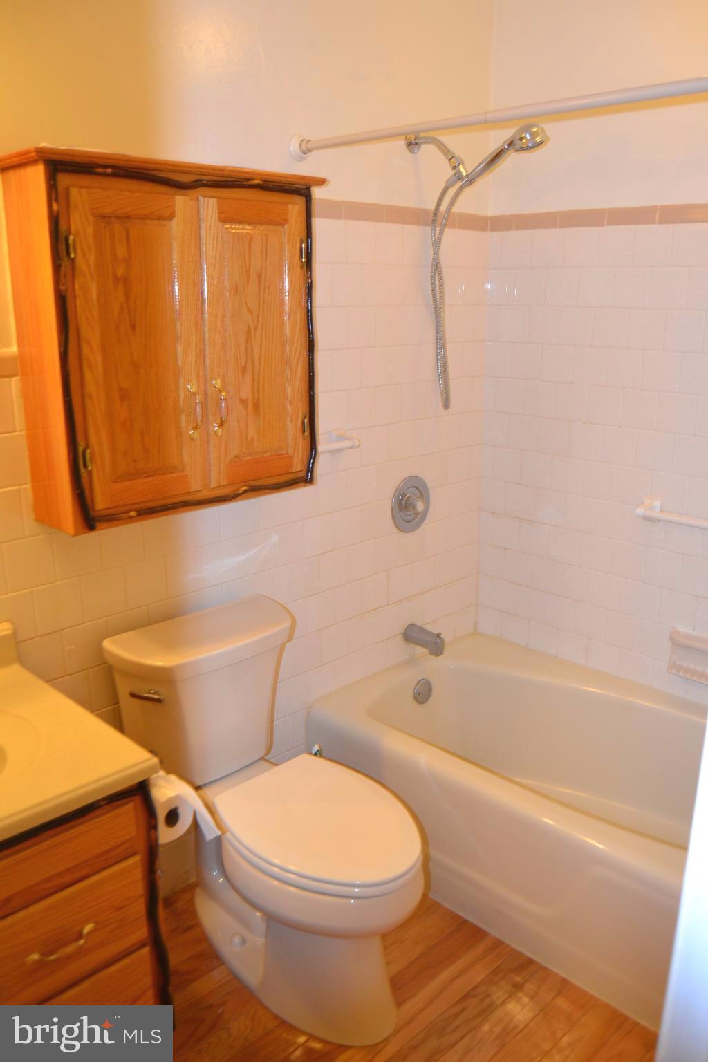 7943 Yellow Springs Road Frederick, MD 21702 - Photo 14 of 21 a bathroom with a toilet and a bathtub