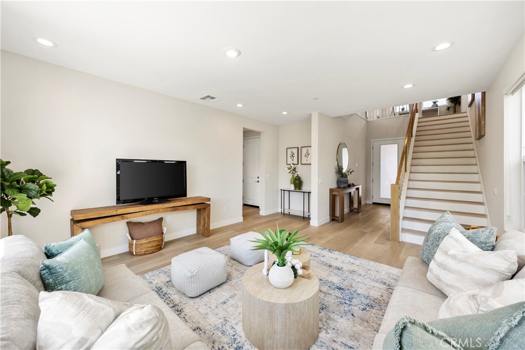 130 Pin Lane Lake Forest, CA 92630 - Photo 11 of 70 a living room with furniture and flat screen tv