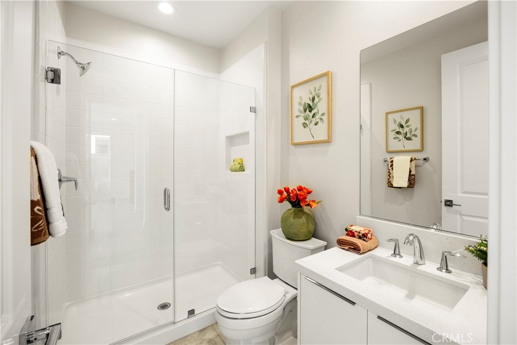 130 Pin Lane Lake Forest, CA 92630 - Photo 16 of 70 a bathroom with a sink toilet and shower
