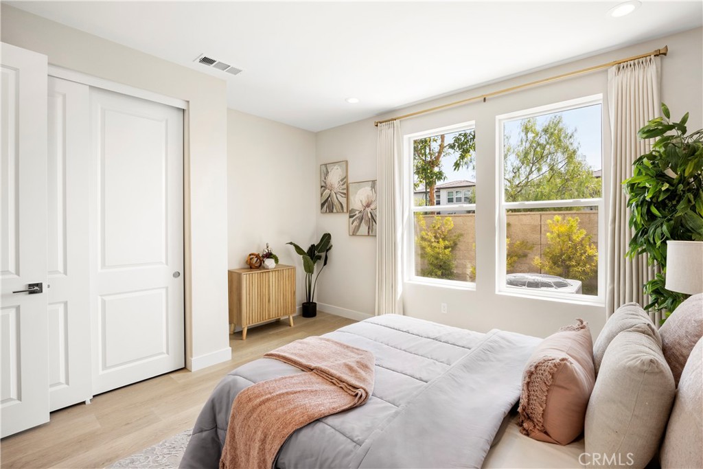 130 Pin Lane Lake Forest, CA 92630 - Photo 18 of 70 a bedroom with a bed and a window