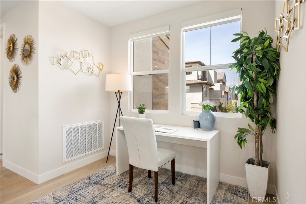 130 Pin Lane Lake Forest, CA 92630 - Photo 19 of 70 a dining room with furniture and a potted plant
