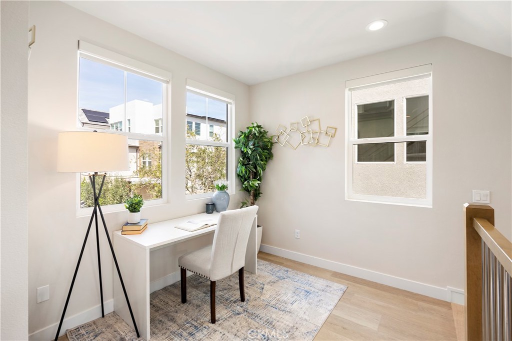 130 Pin Lane Lake Forest, CA 92630 - Photo 21 of 70 a view of a dining room with furniture window and wooden floor