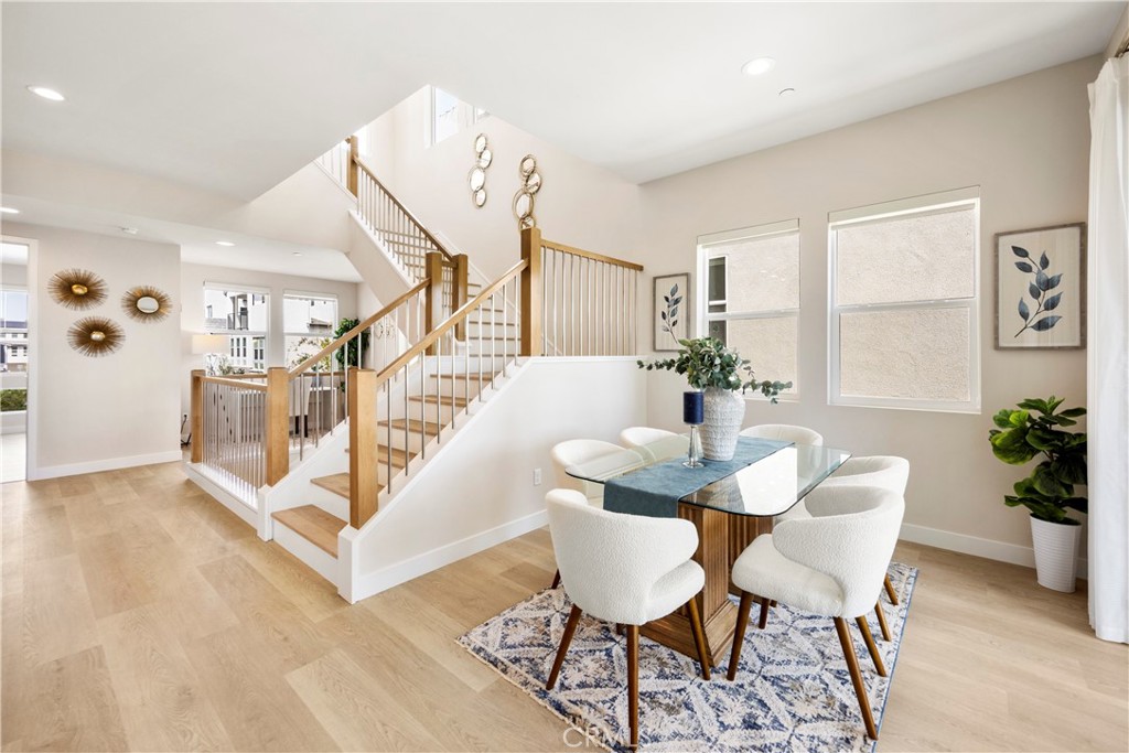 130 Pin Lane Lake Forest, CA 92630 - Photo 30 of 70 a dining room with furniture and wooden floor