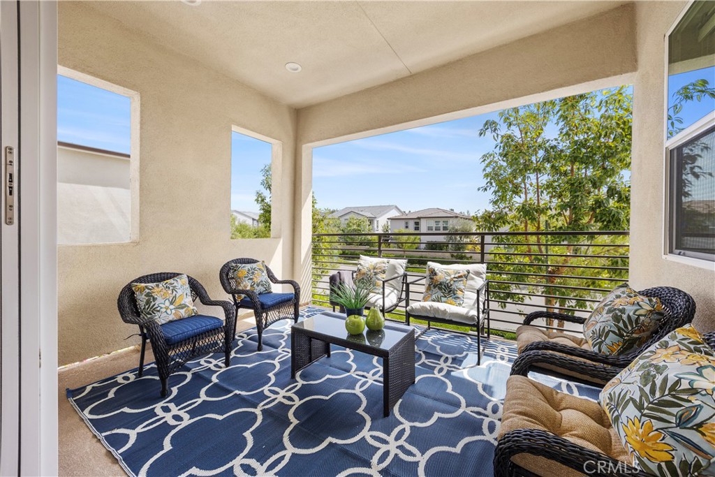 130 Pin Lane Lake Forest, CA 92630 - Photo 33 of 70 a living room with furniture and floor to ceiling windows