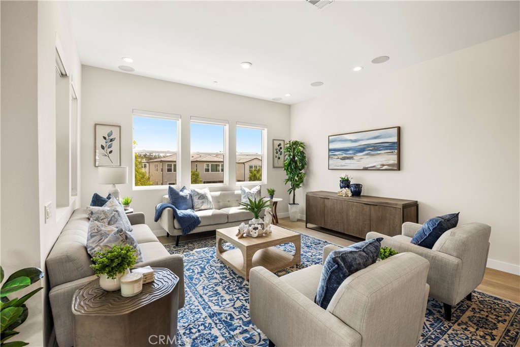 130 Pin Lane Lake Forest, CA 92630 - Photo 36 of 70 a living room with furniture and a large window