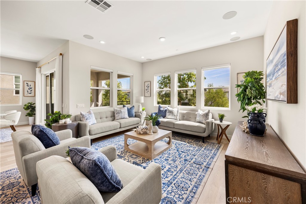 130 Pin Lane Lake Forest, CA 92630 - Photo 37 of 70 a living room with furniture and a large window