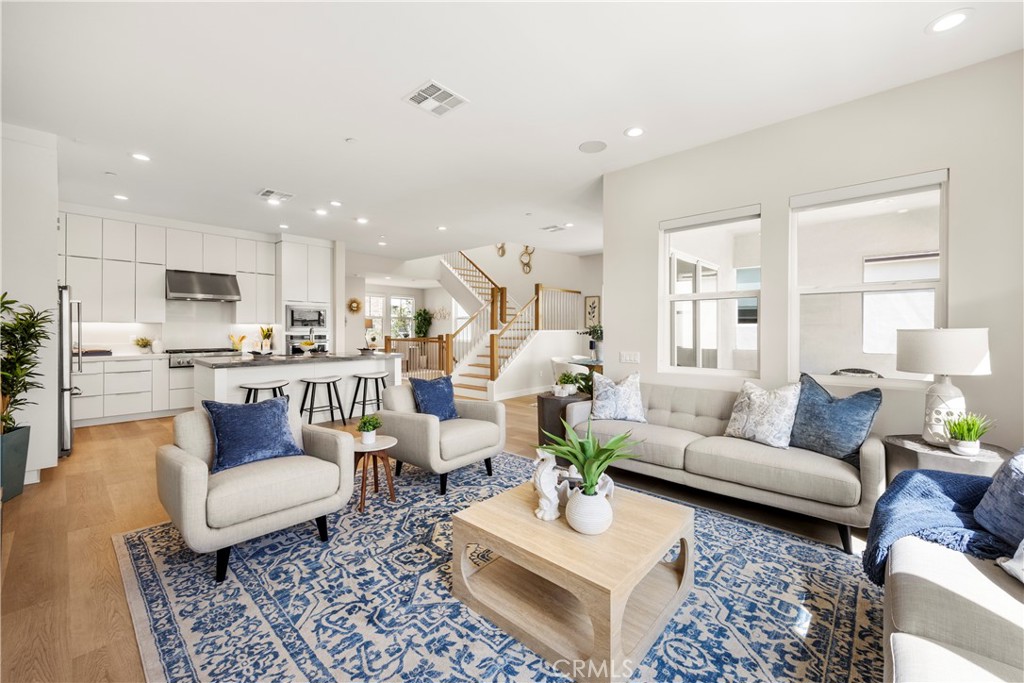 130 Pin Lane Lake Forest, CA 92630 - Photo 38 of 70 a living room with furniture and view of kitchen