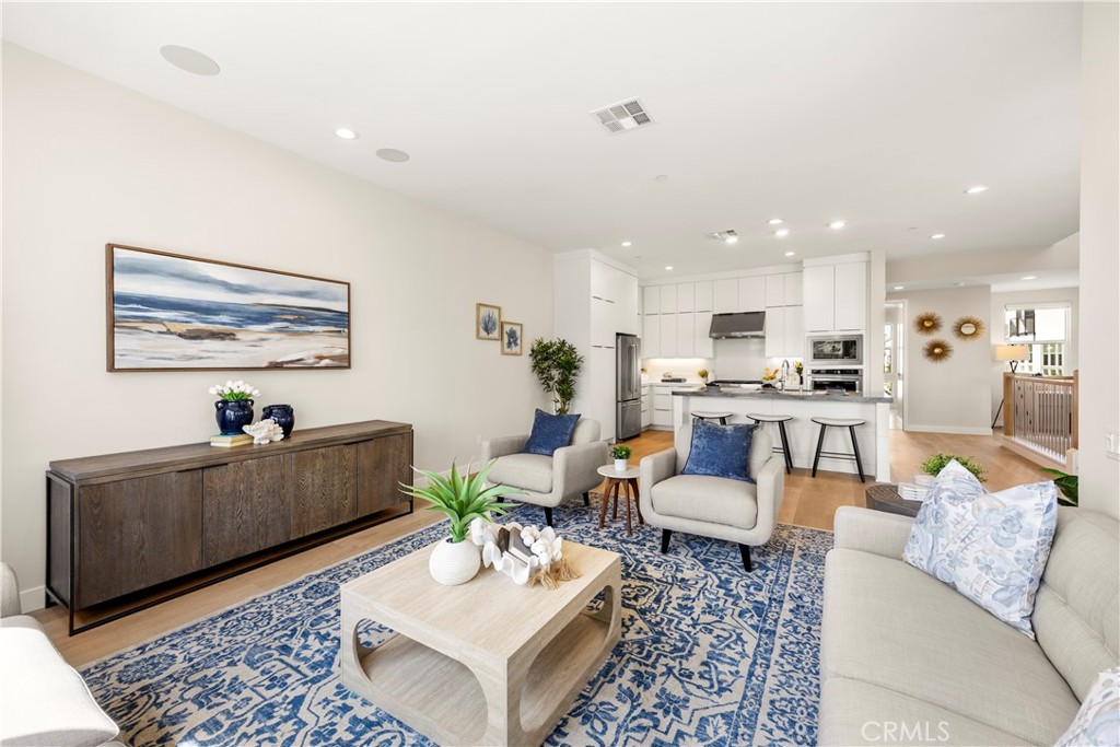 130 Pin Lane Lake Forest, CA 92630 - Photo 39 of 70 a living room with furniture and kitchen view