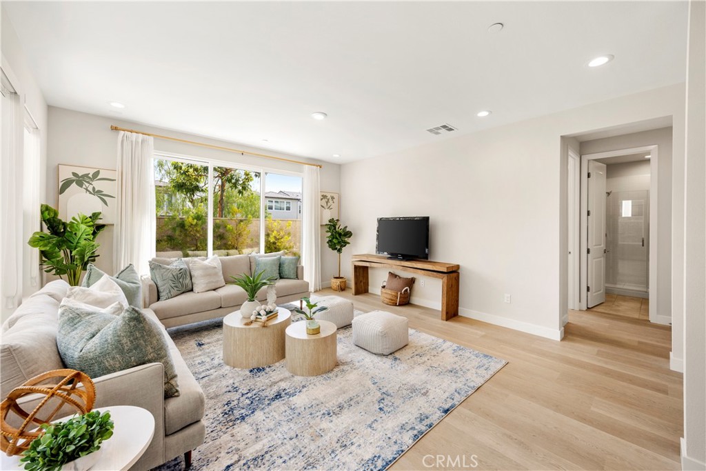 130 Pin Lane Lake Forest, CA 92630 - Photo 8 of 70 a living room with furniture and a flat screen tv