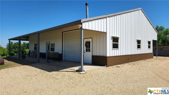a house view with a outdoor space