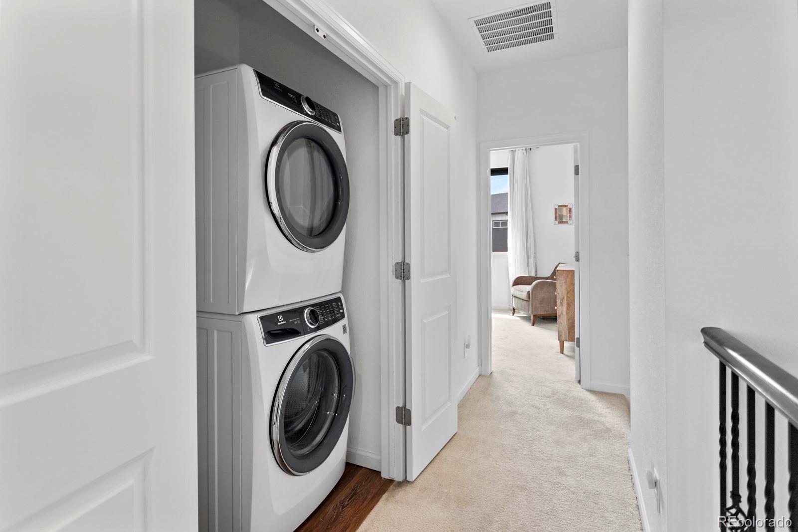 5105 Vivian Street Wheat Ridge, CO 80033 - Photo 21 of 39 a utility room with dryer and washer