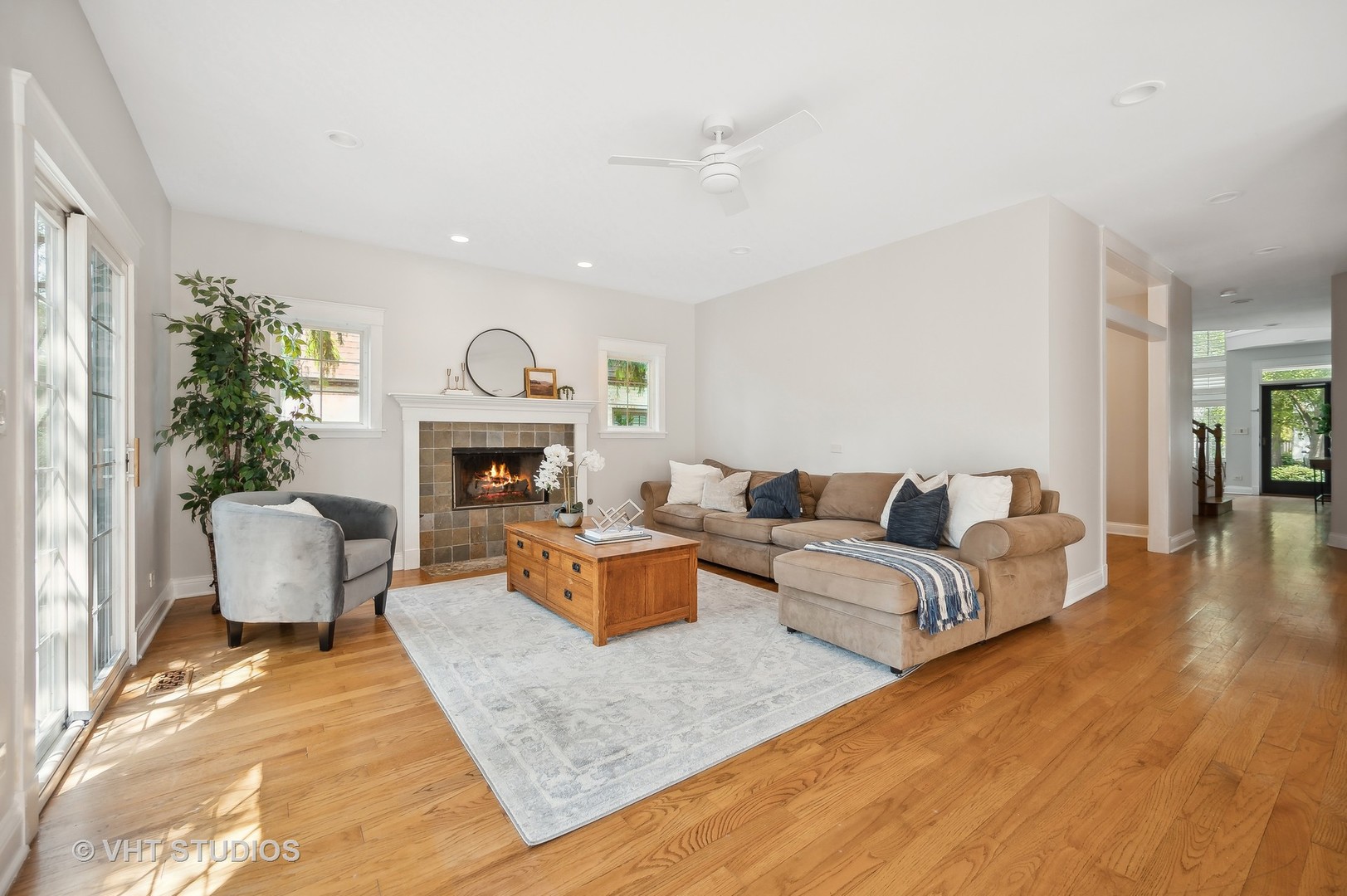 724 Juniper Road Glenview, IL 60025 - Photo 5 of 27 a living room with fireplace furniture and a fireplace