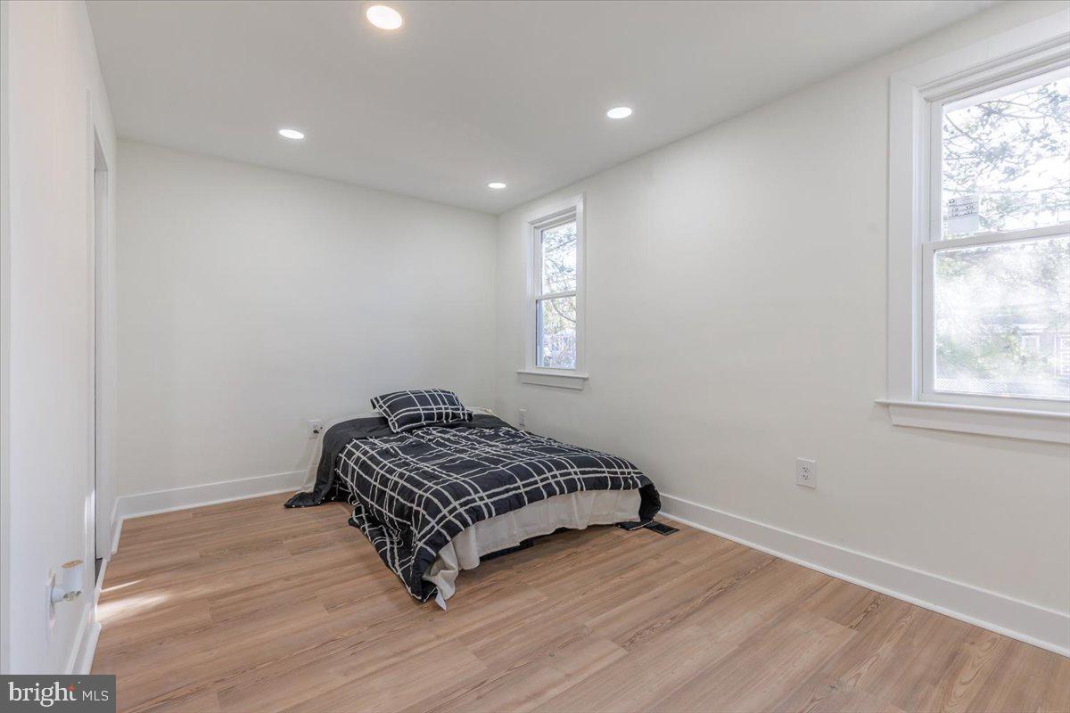 4702 Meade Street Northeast Washington, DC 20019 - Photo 27 of 28 a room with a bed and a window