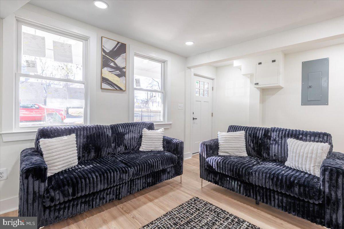 4702 Meade Street Northeast Washington, DC 20019 - Photo 5 of 28 a living room with furniture and a couch