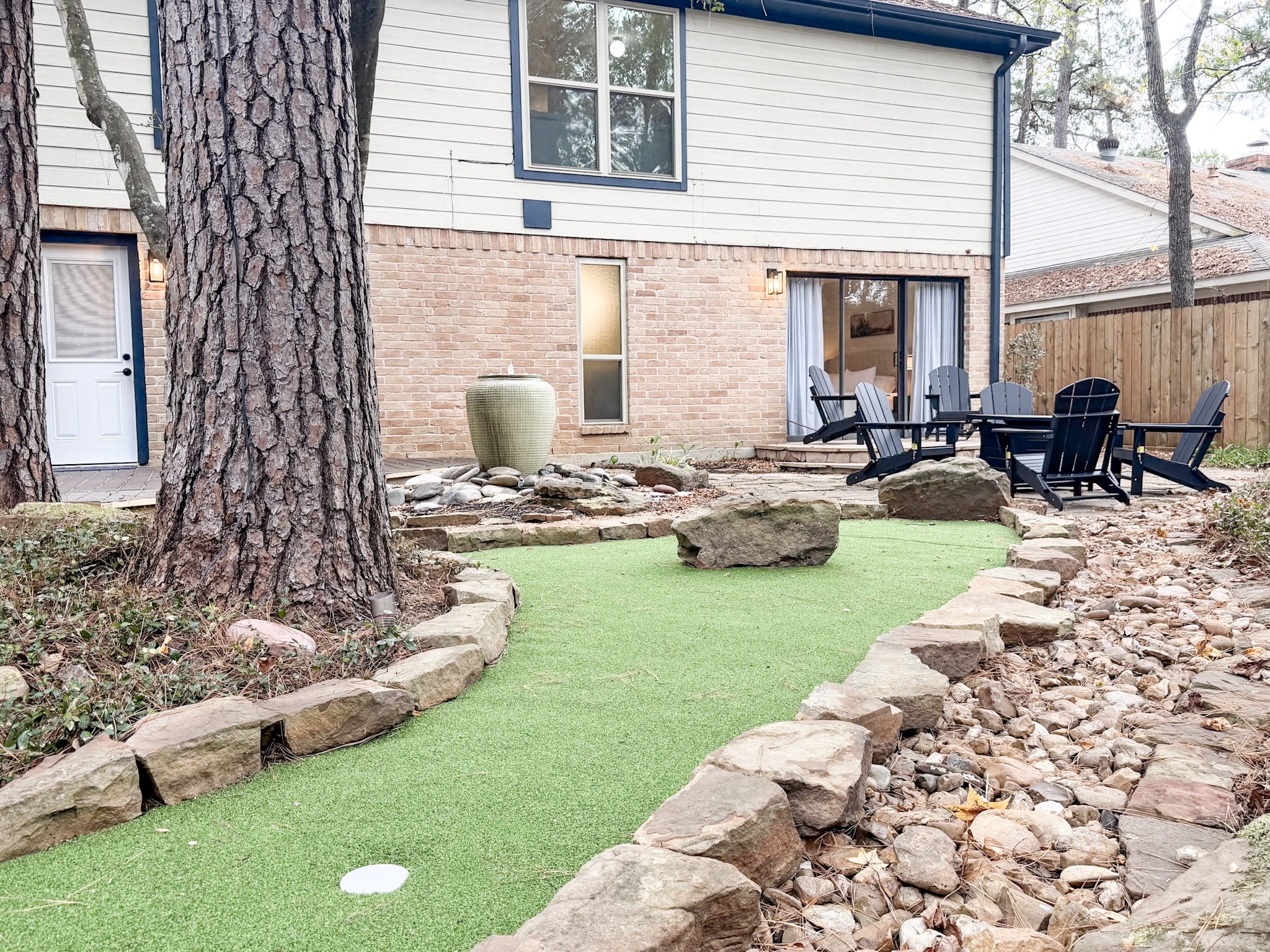 29 Pinewood Forest Court Spring, TX 77381 - Photo 48 of 48 a view of a patio with chairs and plants