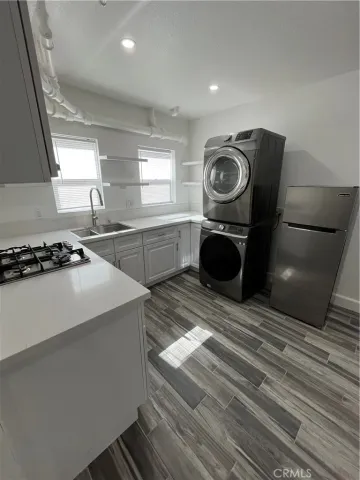 a view of kitchen and sink