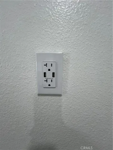 a kitchen with a sink cabinets and a stove