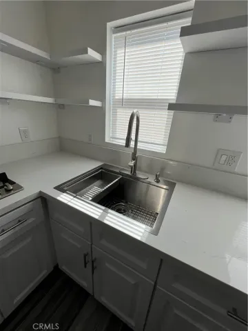 a view of wooden floor in a bathroom