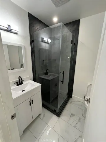 a view of wooden floor in a kitchen