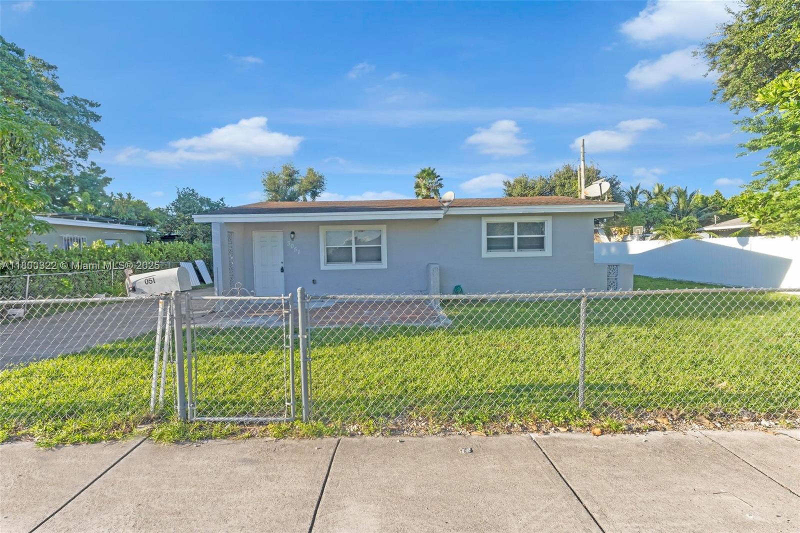 3051 Northwest 77th Street Miami, FL 33147 - Photo 35 of 44 a house view with a garden space