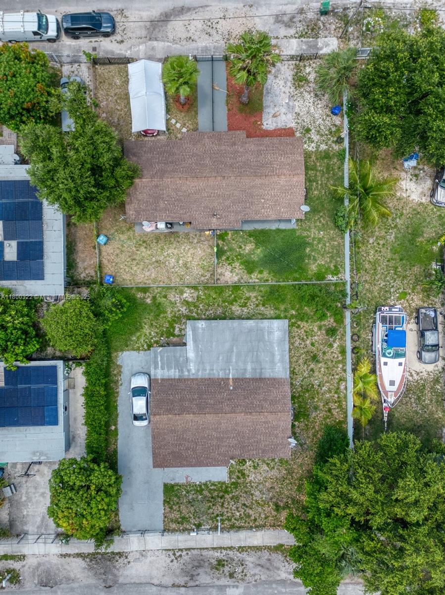 3051 Northwest 77th Street Miami, FL 33147 - Photo 7 of 44 an aerial view of a house