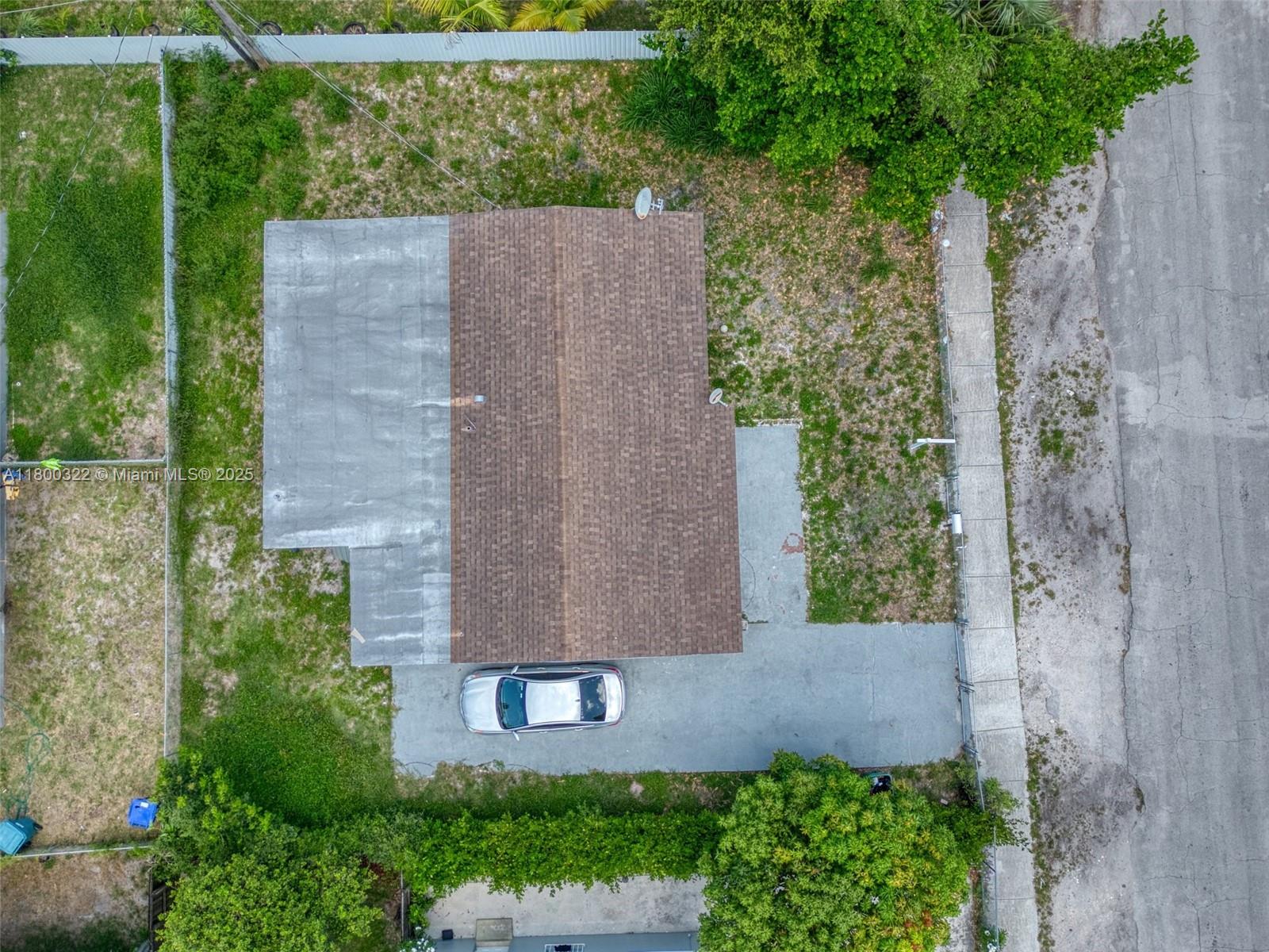 3051 Northwest 77th Street Miami, FL 33147 - Photo 9 of 44 an aerial view of a house