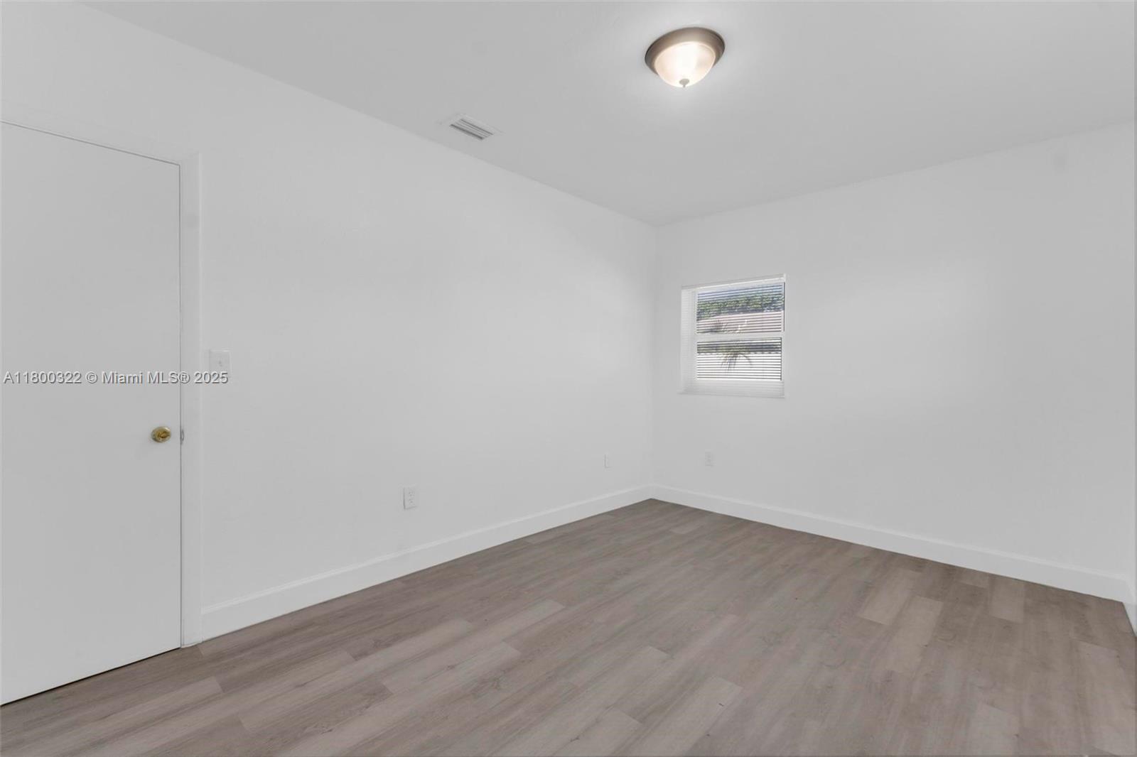 3051 Northwest 77th Street Miami, FL 33147 - Photo 10 of 44 a view of a room