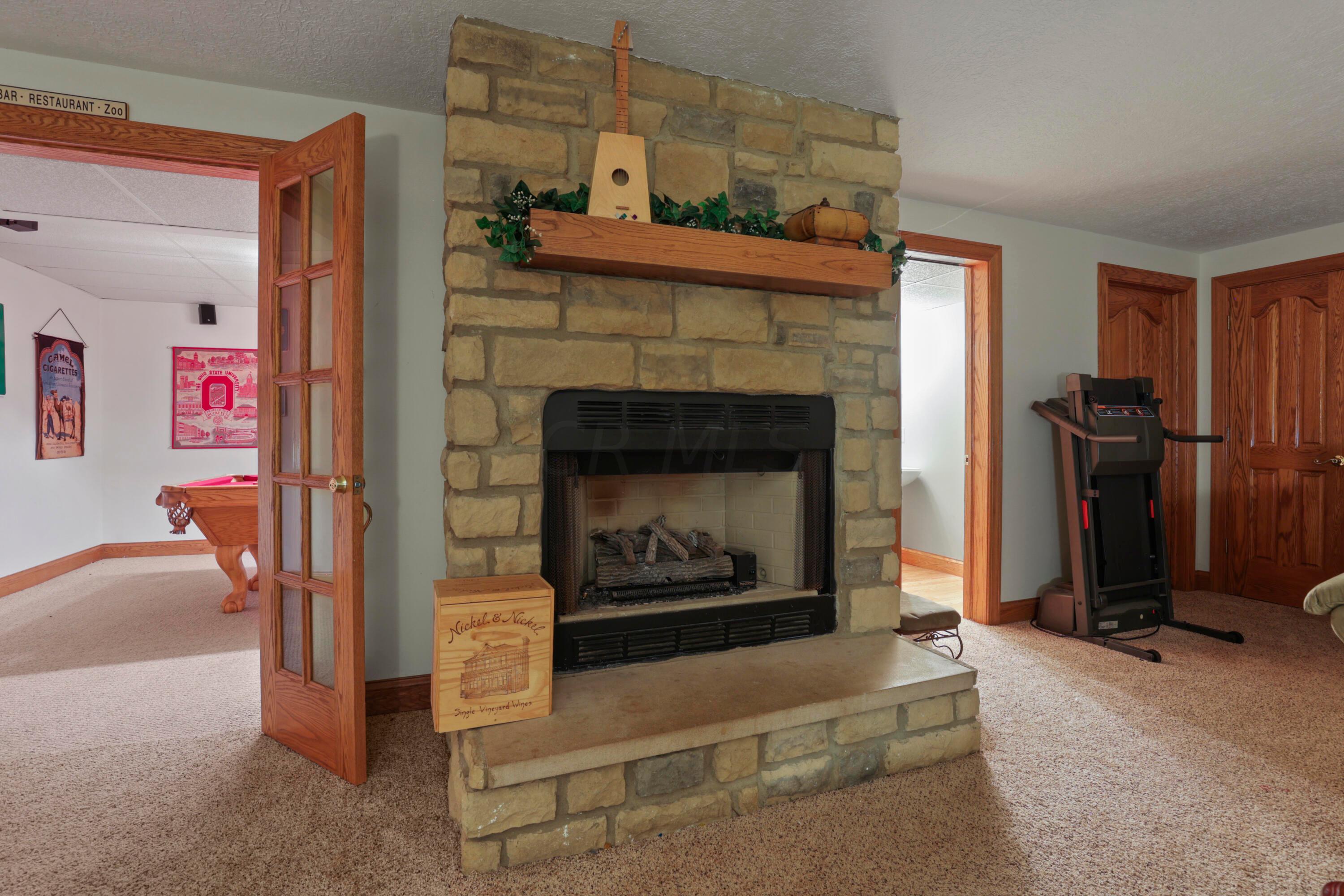7610 Beecher Road Southwest Pataskala, OH 43062 - Photo 40 of 53 Rec Rm Fireplace