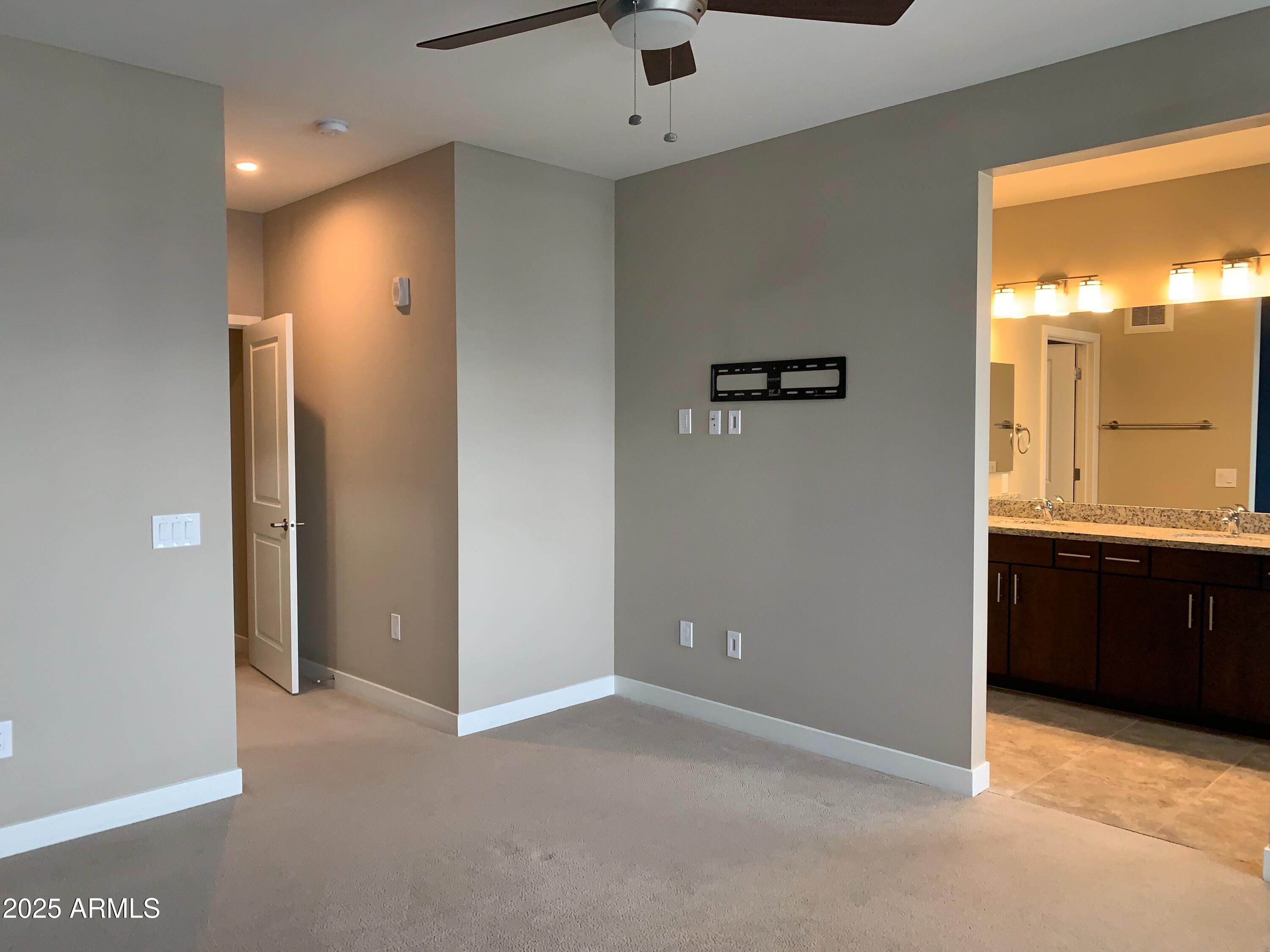 2511 West Queen Creek Road, Unit 326 Chandler, AZ 85248 - Photo 23 of 32 a view of an empty room with a window