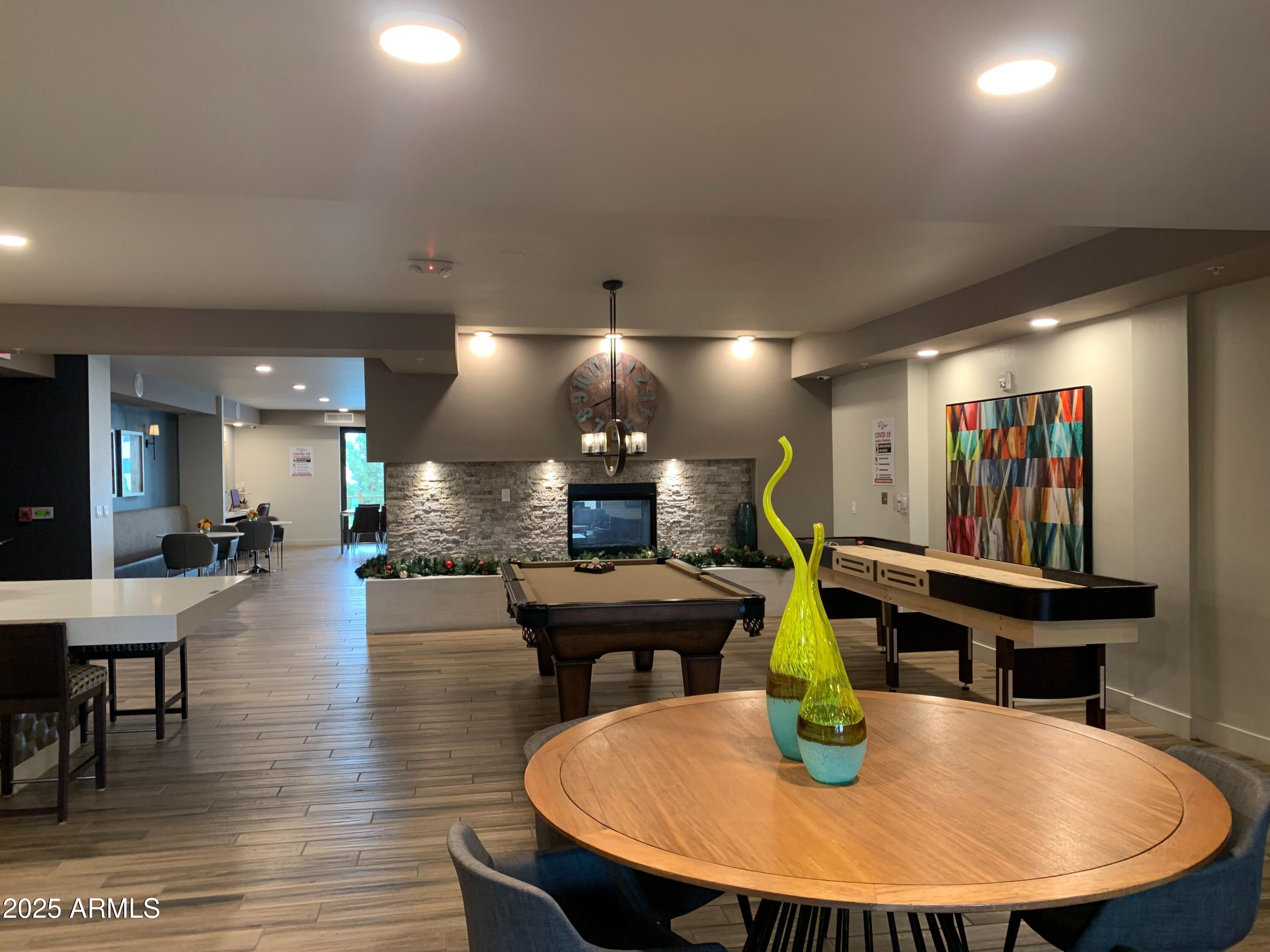 2511 West Queen Creek Road, Unit 326 Chandler, AZ 85248 - Photo 26 of 32 a view of a dining room with furniture