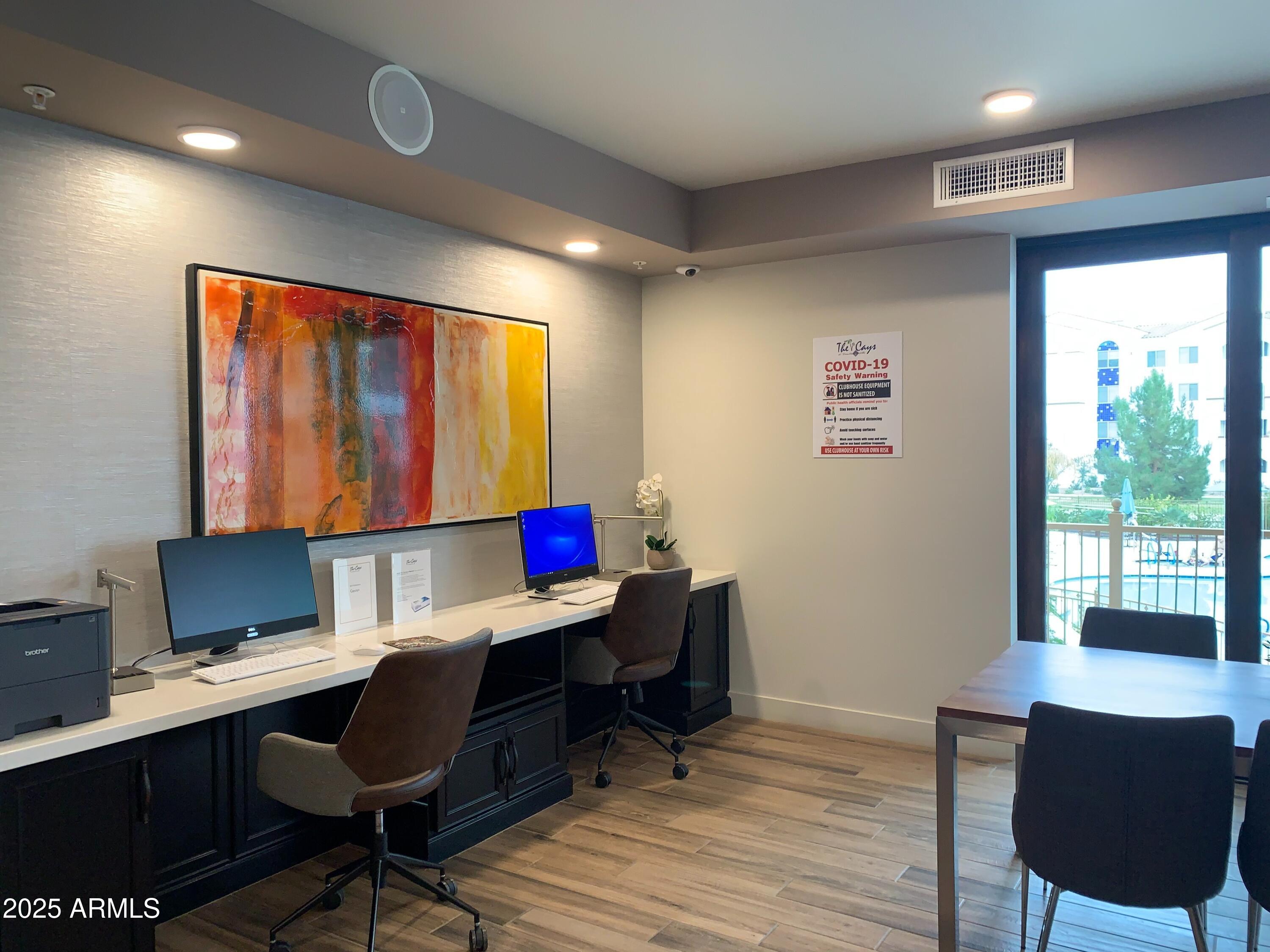 2511 West Queen Creek Road, Unit 326 Chandler, AZ 85248 - Photo 28 of 32 a workspace with furniture and window