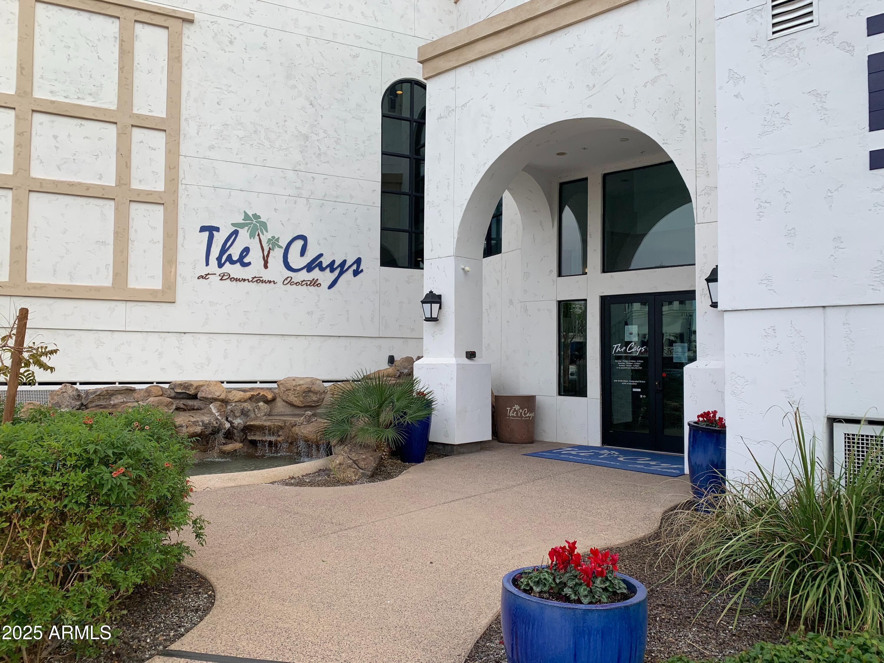 2511 West Queen Creek Road, Unit 326 Chandler, AZ 85248 - Photo 32 of 32 a front view of a house with plants
