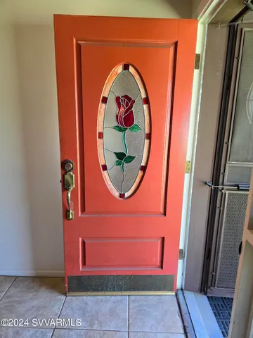 a bathroom with a tub and shower